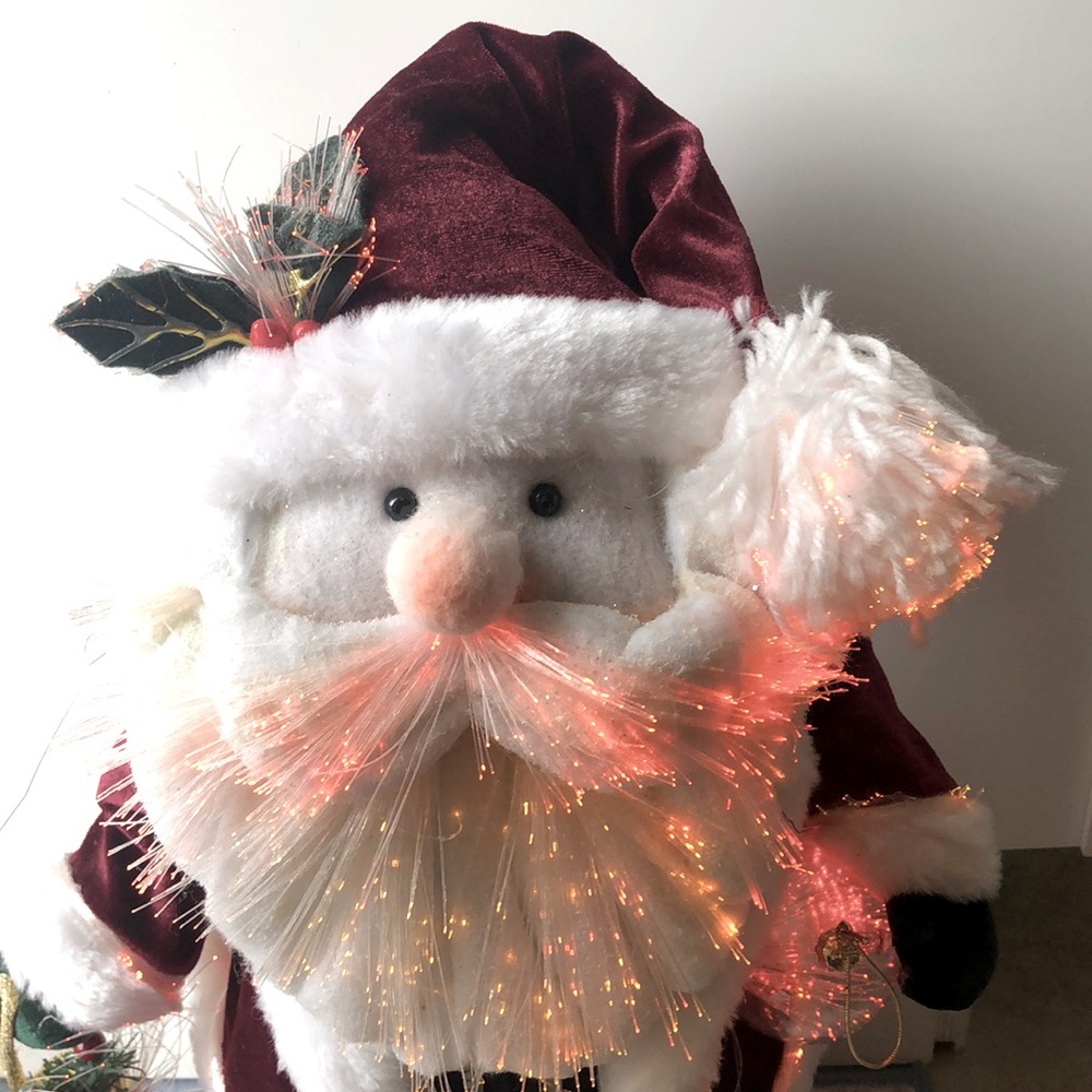 Fiber optic Christmas Santa, beard, outfit, bag all have fiber optic throughout.